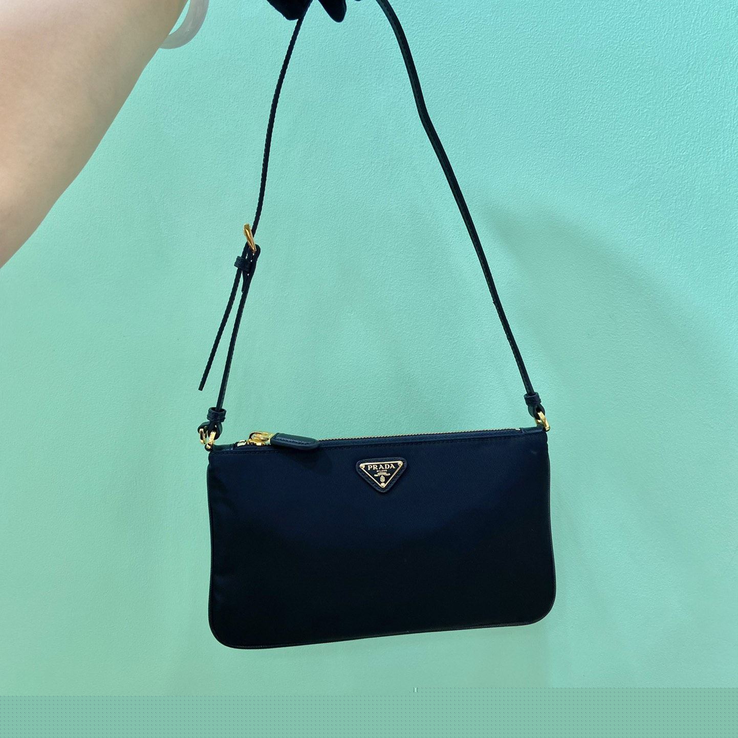 Pra*a top handle bags